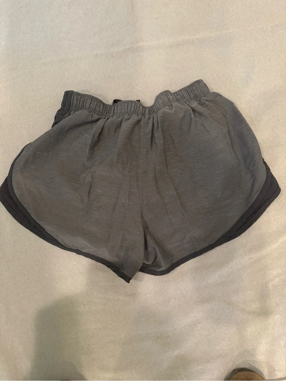Nike Women's Gray and Black Athletic Running Shorts with Subtle Swoosh Active M